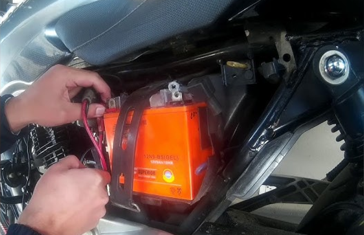 removing old battery from motorcycle